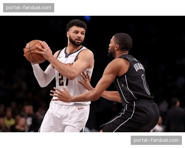 战术深析：掘金队为何在关键时刻多次使用“约基奇-戈登”空接战术